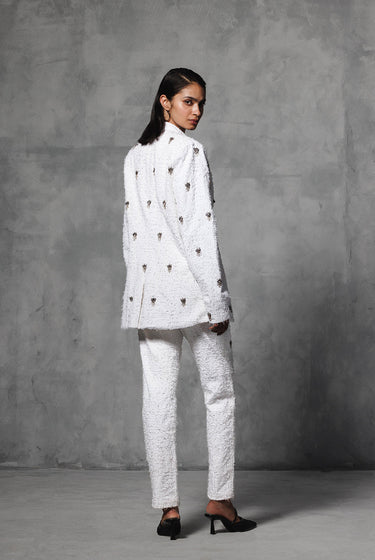 DISTRESSED TWILL EMBELLISHED PANTS